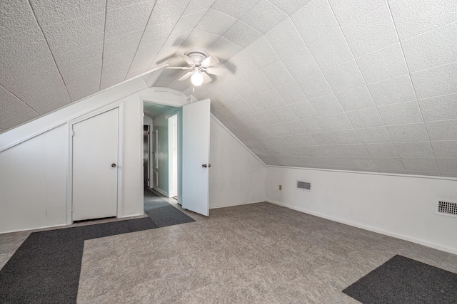 bonus room with carpet and lofted ceiling