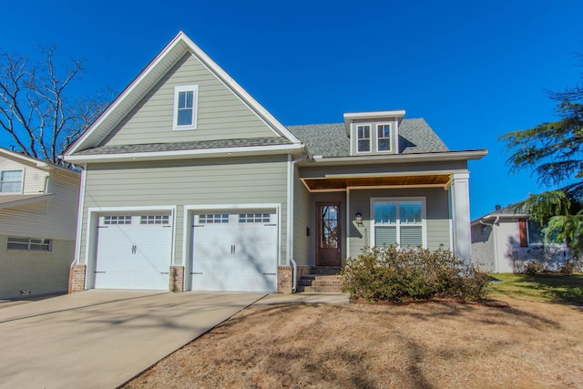 view of front of property featuring a garage