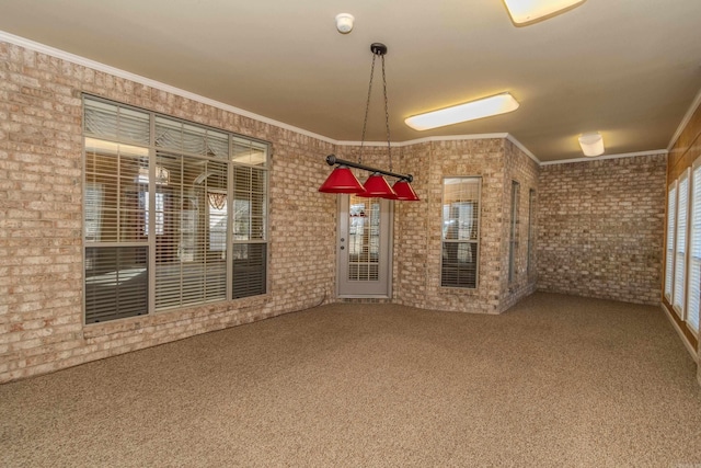 carpeted empty room featuring ornamental molding