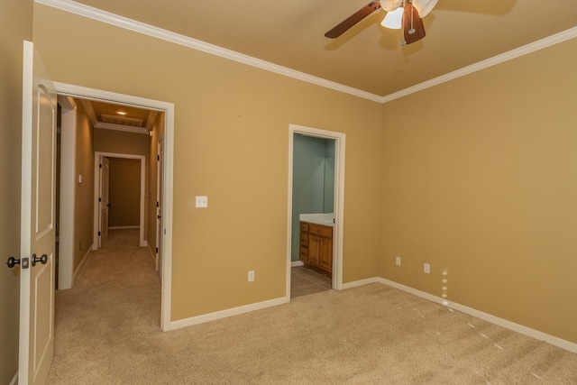 unfurnished bedroom with ornamental molding, light carpet, connected bathroom, and ceiling fan