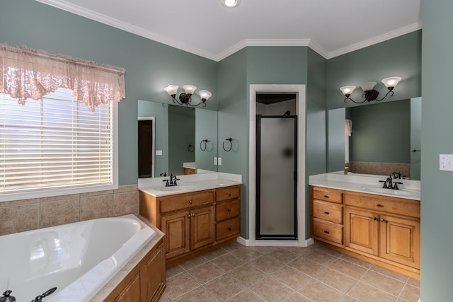 bathroom with vanity, tile patterned floors, ornamental molding, and shower with separate bathtub