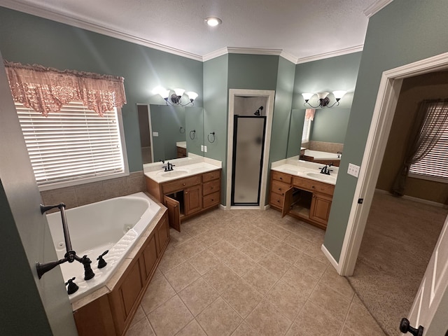 bathroom featuring crown molding, vanity, separate shower and tub, and tile patterned flooring