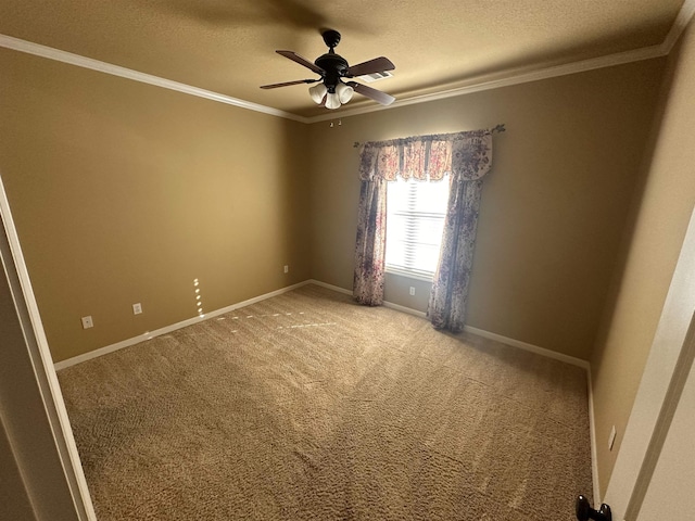 unfurnished room featuring ornamental molding, carpet floors, a textured ceiling, and ceiling fan