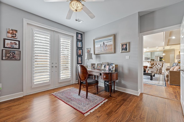 office space featuring ceiling fan, dark hardwood / wood-style flooring, and french doors