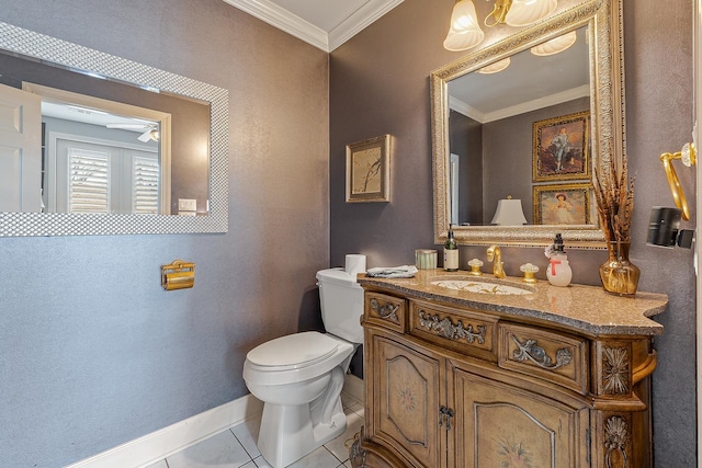 bathroom with toilet, ornamental molding, tile patterned floors, and vanity