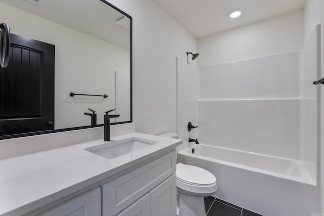 full bathroom featuring shower / bathing tub combination, vanity, tile patterned flooring, and toilet