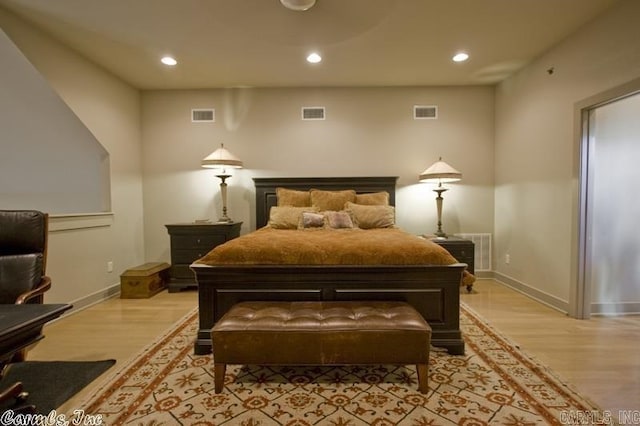 bedroom with light hardwood / wood-style flooring