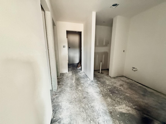 hallway featuring concrete floors