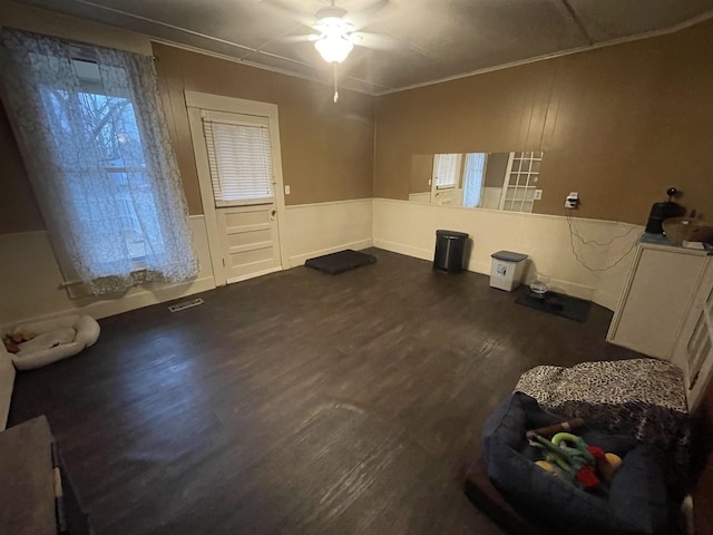 spare room featuring ceiling fan and dark hardwood / wood-style floors