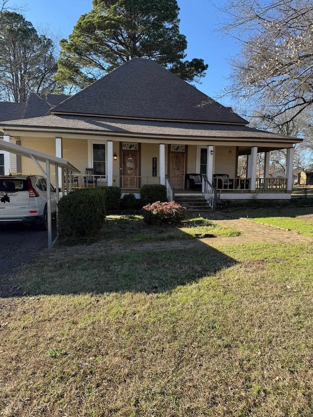 view of front of house featuring a front lawn and a porch