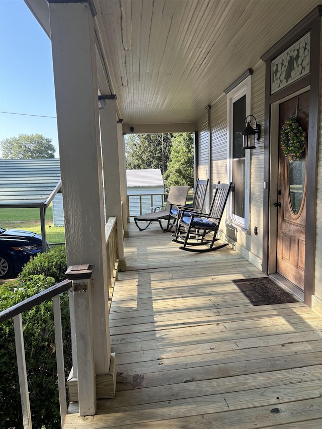 deck featuring a porch