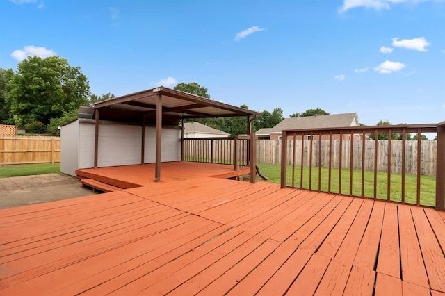 wooden terrace with a yard