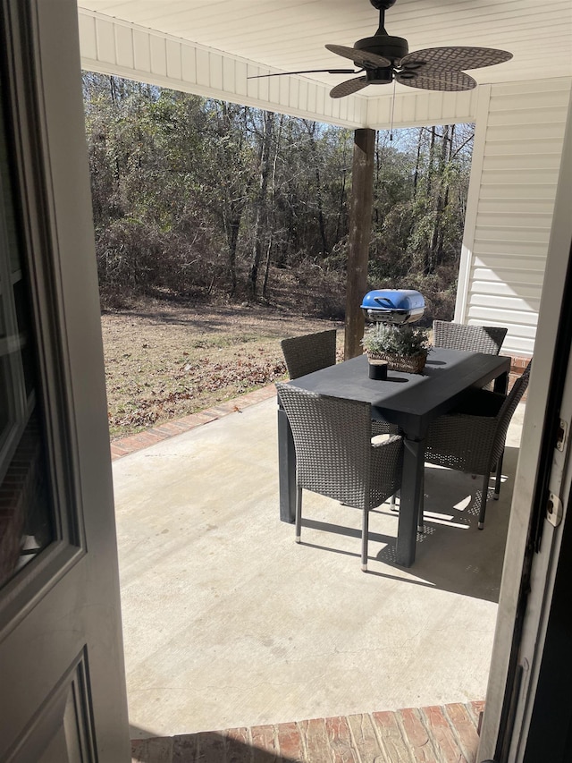 view of patio featuring ceiling fan