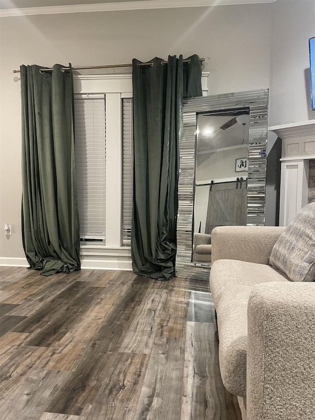 bedroom with crown molding and wood-type flooring