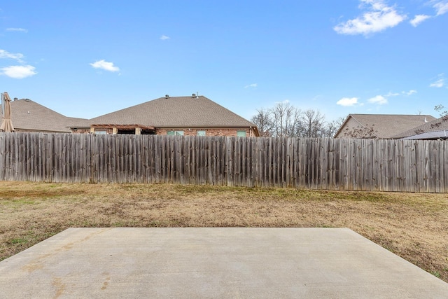 view of yard with a patio area