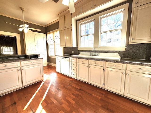 kitchen with decorative backsplash, dishwasher, and ceiling fan