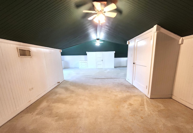 additional living space with lofted ceiling and ceiling fan