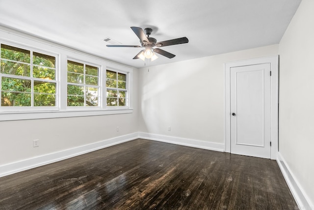 empty room featuring hardwood / wood-style flooring and ceiling fan