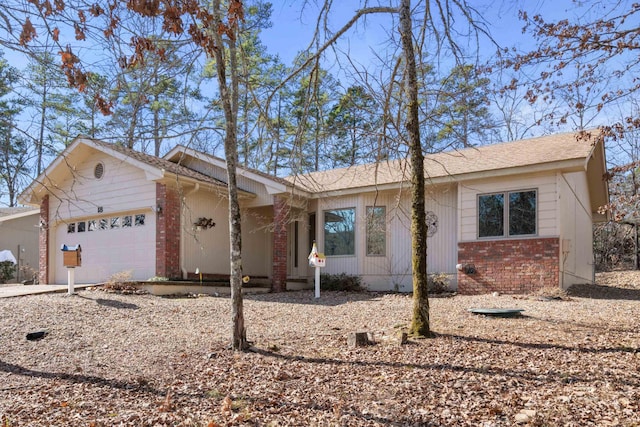 single story home featuring a garage