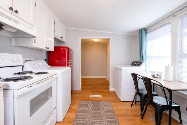 kitchen featuring white cabinetry, light hardwood / wood-style floors, electric range, crown molding, and washer / clothes dryer