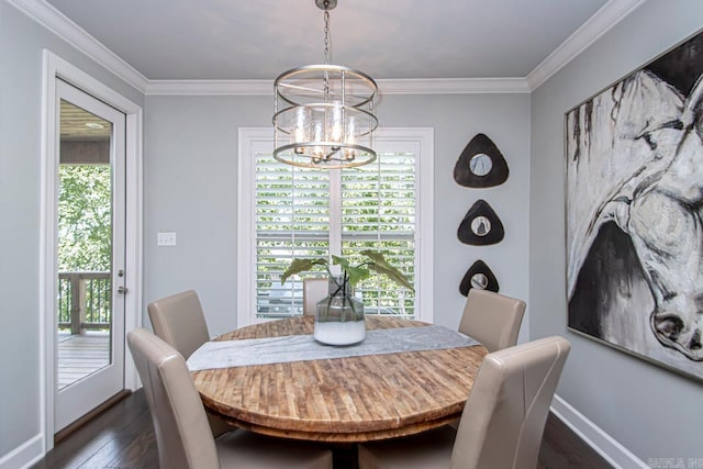 dining room featuring a notable chandelier, crown molding, and dark hardwood / wood-style floors