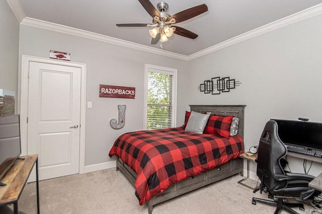 bedroom with ceiling fan, carpet, and crown molding