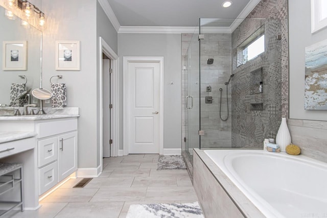 bathroom with vanity, ornamental molding, and shower with separate bathtub