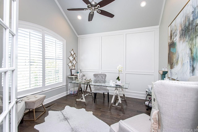 office area featuring ceiling fan, dark wood-type flooring, ornamental molding, and vaulted ceiling