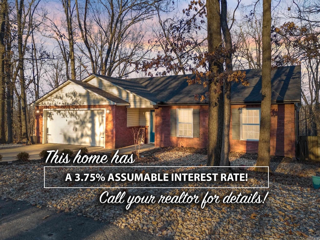 view of front of property with a garage