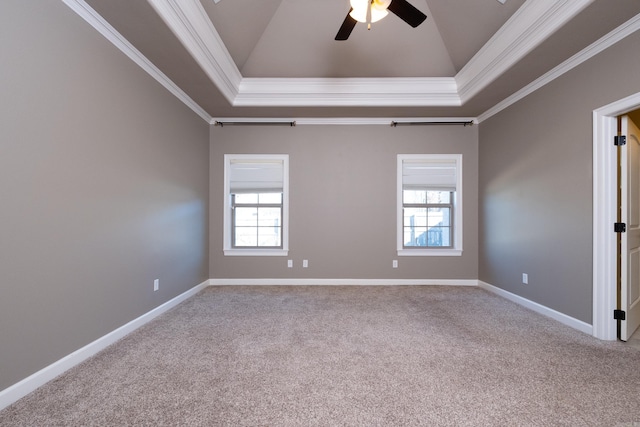 empty room with ornamental molding, carpet floors, and lofted ceiling