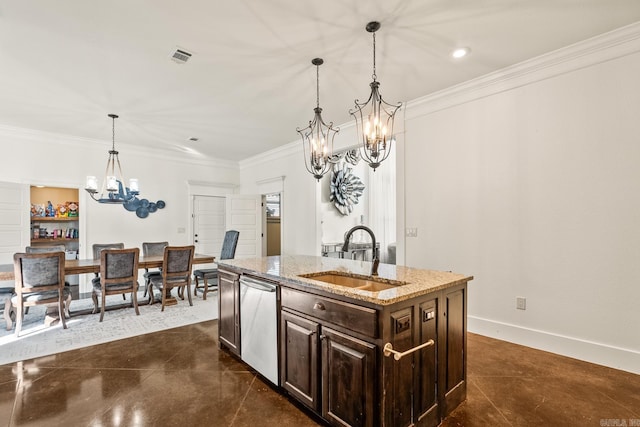 kitchen featuring stainless steel dishwasher, sink, decorative light fixtures, light stone counters, and a center island with sink