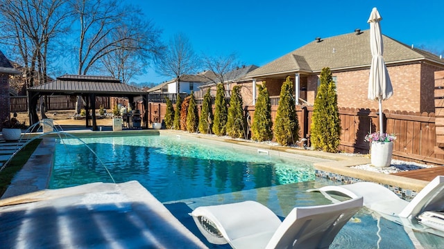 view of swimming pool with a gazebo