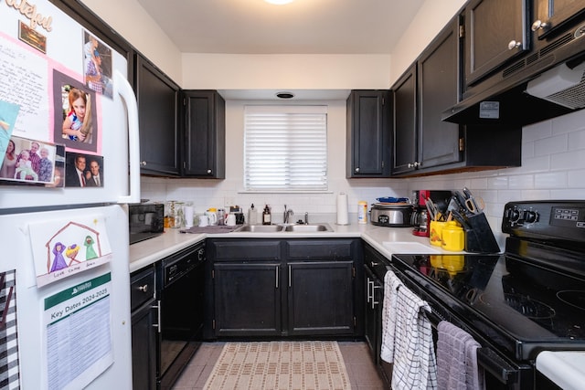 kitchen with black appliances, light tile patterned floors, decorative backsplash, and sink