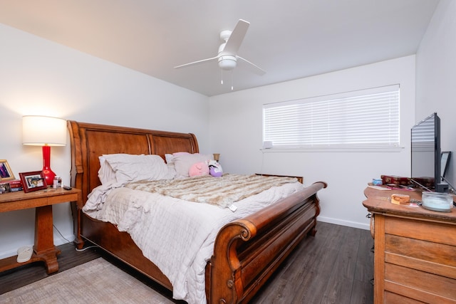 bedroom featuring ceiling fan and dark hardwood / wood-style flooring