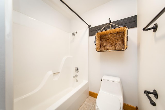 bathroom with toilet, shower / bathing tub combination, and tile patterned flooring