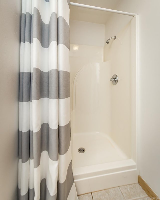 bathroom featuring walk in shower