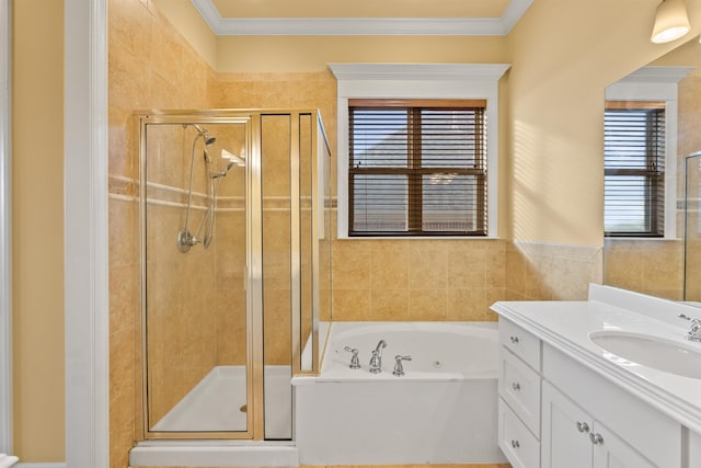 bathroom with vanity, ornamental molding, and plus walk in shower