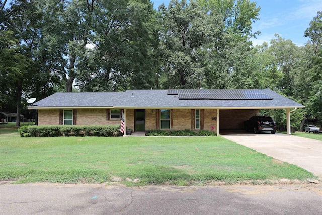 ranch-style home with a front lawn and a carport