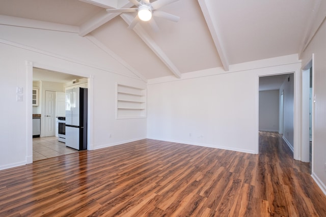 unfurnished living room featuring built in features, dark wood-type flooring, vaulted ceiling with beams, and ceiling fan