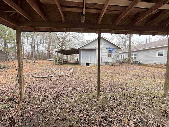 view of yard featuring a carport