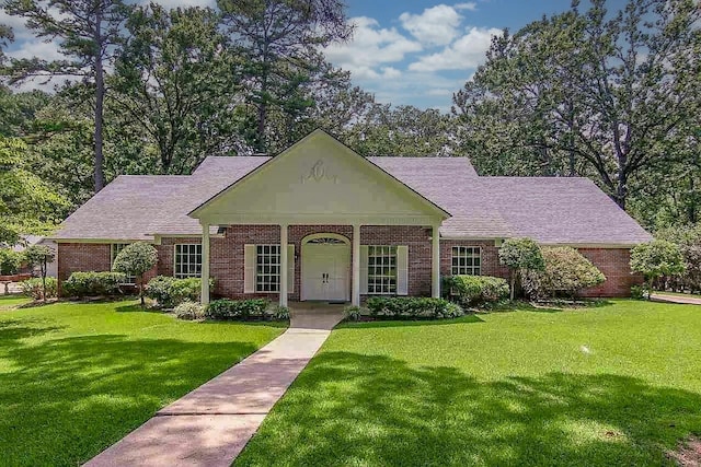 view of front of home with a front yard