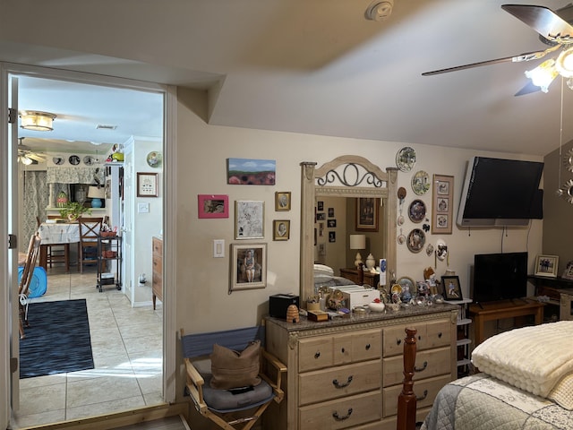 bedroom featuring ceiling fan and light tile patterned floors