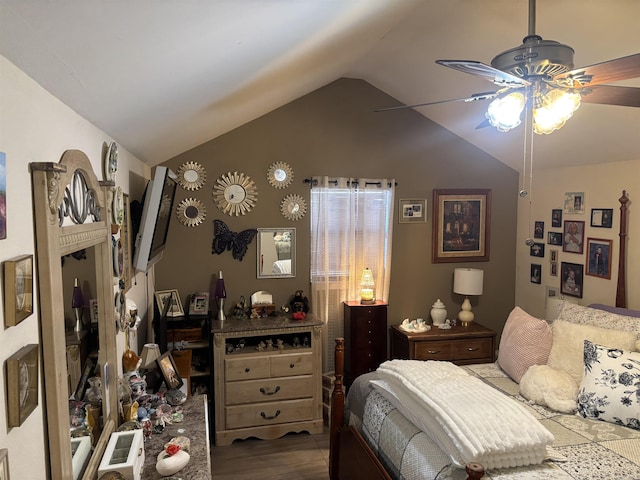 bedroom featuring ceiling fan, hardwood / wood-style floors, and lofted ceiling