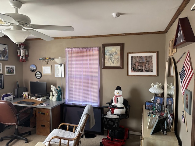 office area with ceiling fan, ornamental molding, and light carpet