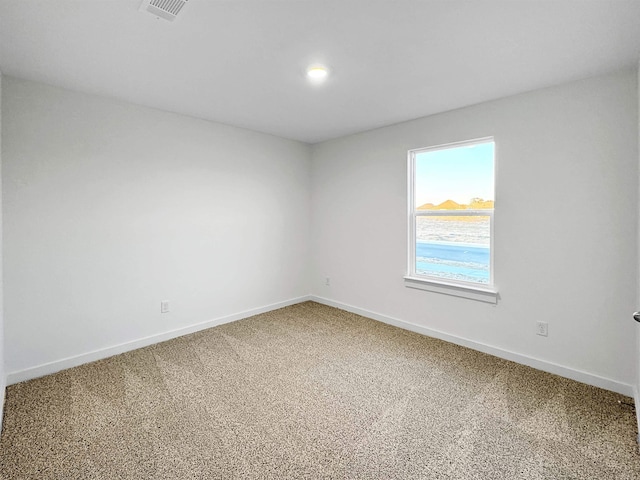 view of carpeted spare room