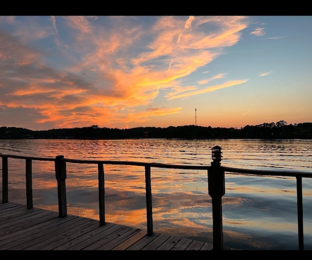 view of dock with a water view