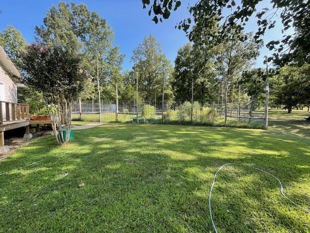 view of yard with a deck