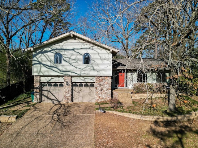 split level home with a garage