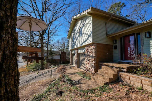 view of side of property featuring a garage