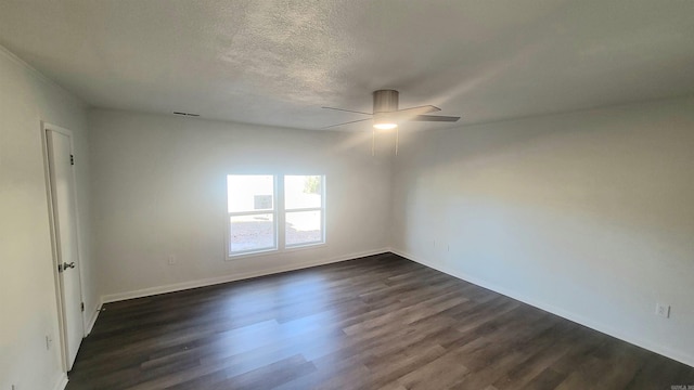 spare room featuring ceiling fan, a textured ceiling, and dark hardwood / wood-style flooring